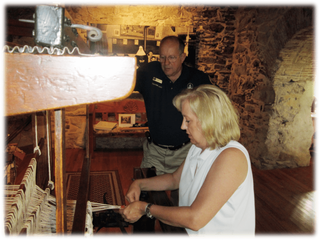 Tying on a new warp in the Mission Espada Visitors Center